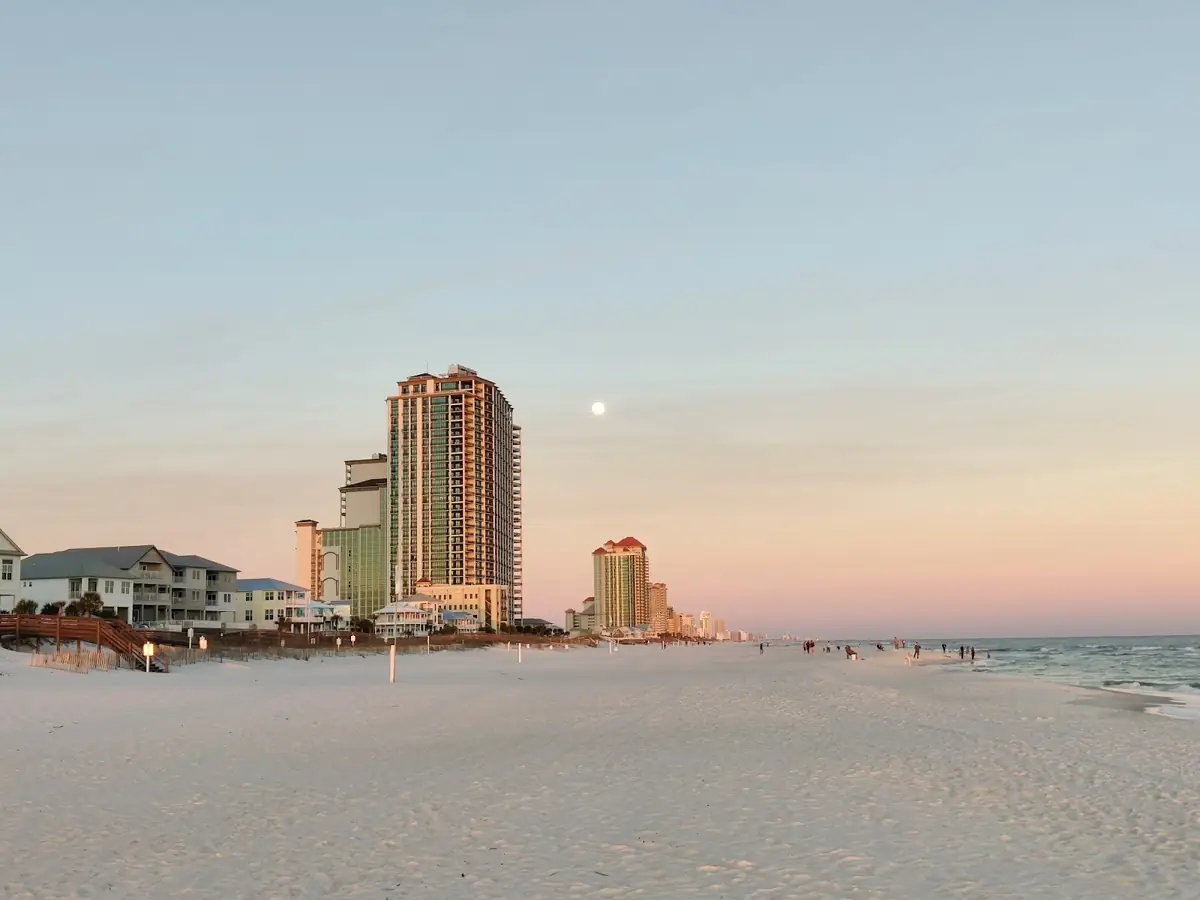 Moon rising over beachfront condos in Orange Beach in the fall